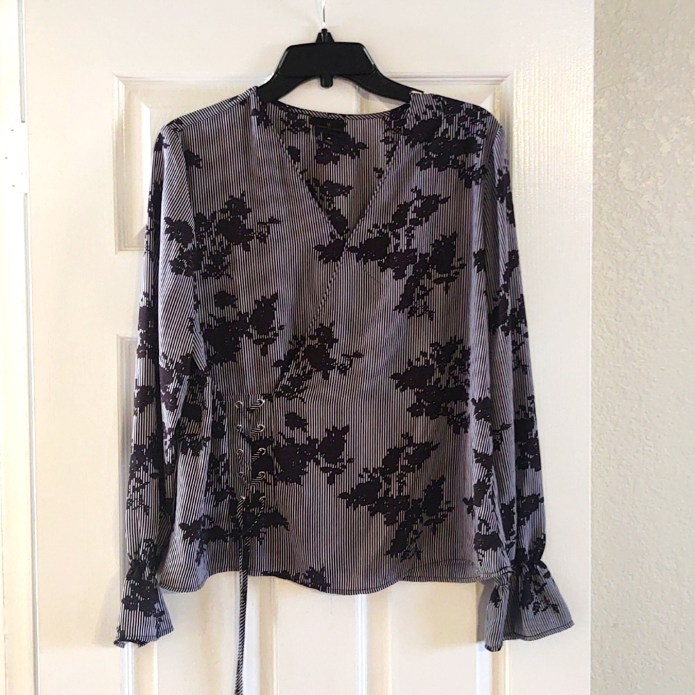 Modern striped/patterned surplice blouse